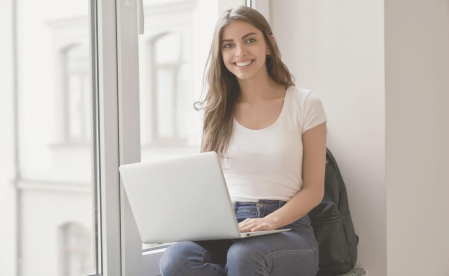 Financial planning workspace with documents and laptop